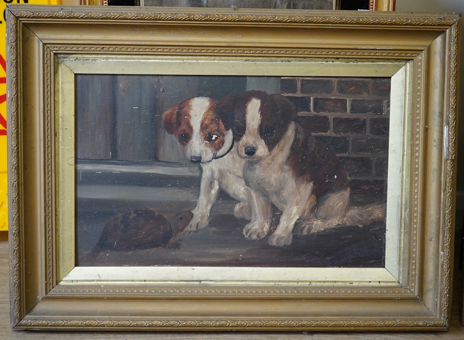 A. Astley, early 20th century, naive oil on board, Study of two dogs and a tortoise, signed, 28 x 47cm. Condition - poor